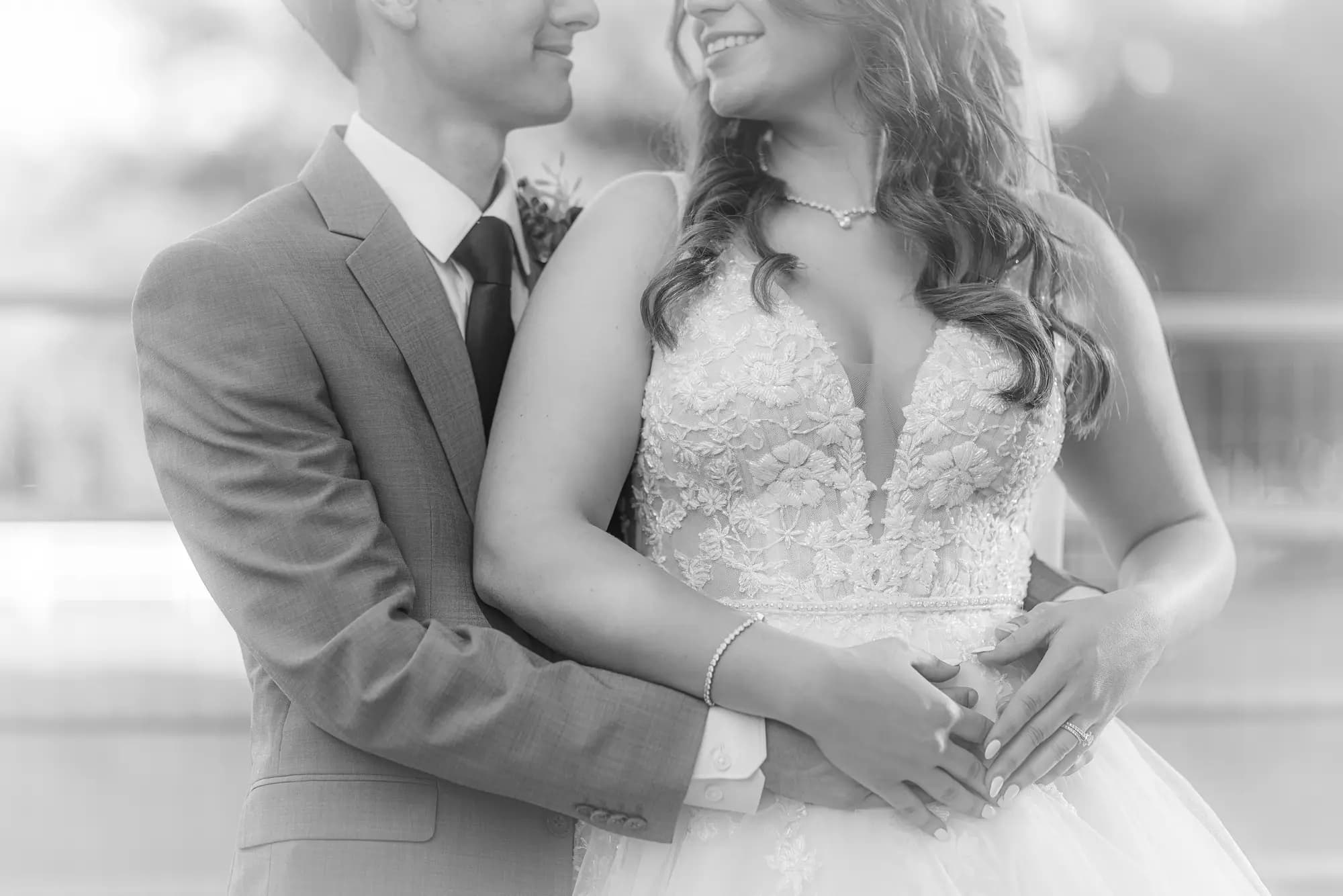 Black and white wedding reception moment — authentic emotion captured in monochrome by Boogietek Photo+Cinema